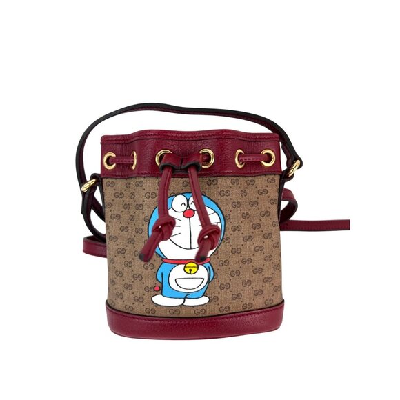 Gucci Handbags - Gucci X Doraemon Vintage GG Supreme Mini Bucket Bag